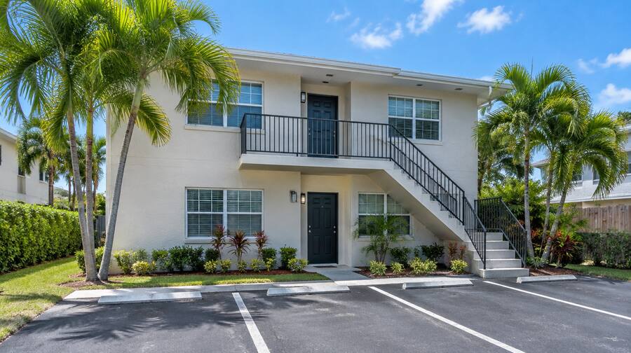 Small two-story multifamily rental building in South Florida.