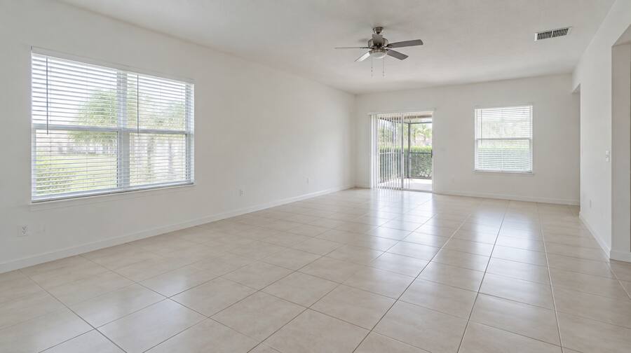 Empty living room of a Florida rental home, cleared and ready to re-let.